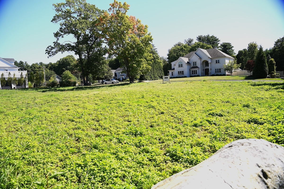 Residential lot at 8 Taylor Terrace in Lynnfield, with neighboring homes in the background
